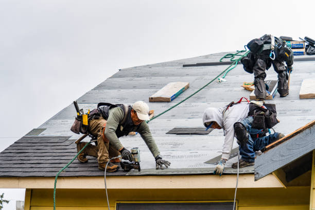 Professional Gutter Installation technician working in Apple Valley, CA